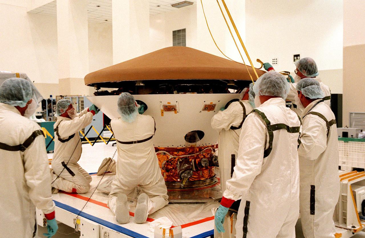 KENNEDY SPACE CENTE, FLA. -- In the Spacecraft Assembly and Encapsulation Facility-2 (SAEF-2), the Mars Polar Lander is unpacked for testing, including a functional test of the science instruments and the basic spacecraft subsystems. The Mars Polar Lander is targeted for launch from Cape Canaveral Air Station aboard a Delta II rocket on Jan. 3, 1999. The solar-powered spacecraft is designed to touch down on the Martian surface near the northern-most boundary of the south pole in order to study the water cycle there. The lander also will help scientists learn more about climate change and current resources on Mars, studying such things as frost, dust, water vapor and condensates in the Martian atmosphere