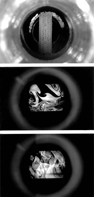 LII is a technique for measuring soot concentration. This image was taken with an ordinary 35-mm camera, these reveal soot distribution within the chimney. Principal Investigator: Dr. Randall L. Vander Wal