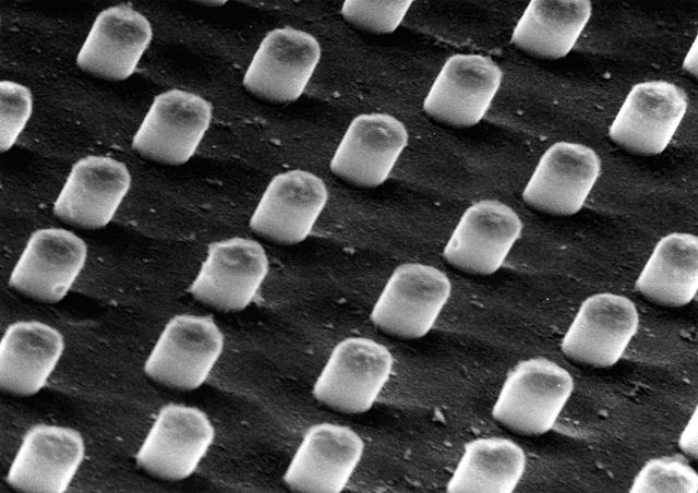An etched sample of the aluminum indium alloy (magnified). When the hypermonotectic mixture is cooled in the Advanced Gradient Hearing Facility (AGHF), aluminum transitions to a solid first, trapping the indium in cylindrical fibers within the solid. Principal Investigator: Dr. Barry Andrews