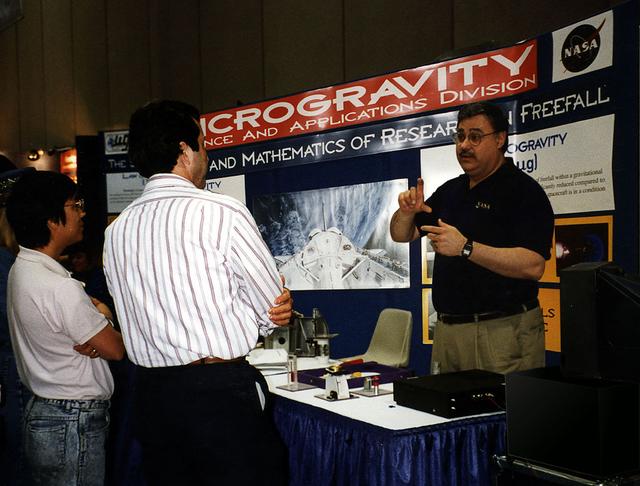Dr. Michael Wargo, program scientist for materials science at NASA headquarters, explains the math and physics principles associated with freefall research to attendees at the arnual conference of the National Council of Teachers of Mathematics.