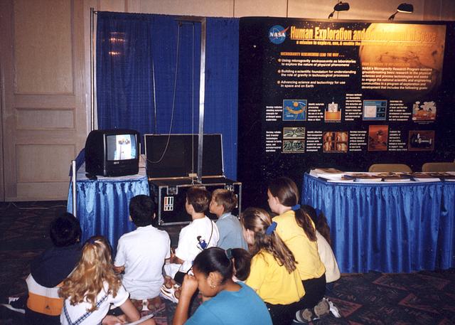 Middle school students learn about gravity and microgravity at the Space '98 conference in Albuquerque, New Mexico, sponsored by the American Society of Civil Engineers (ASCE).
