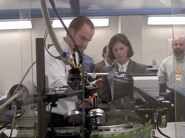 University of Alabama engineer Lance Weiss briefs NASA astronaut Dr. Bornie Dunbar about the design and capabilities of the X-ray Crystallography Facility under development at the Center for Macromolecular Crystallography of the University of Alabama at Birmingham, AL, April 21, 1999. The X-ray Crystallography Facility is designed to speed the collection of protein structure information from crystals grown aboard the International Space Station. By measuring and mapping the protein crystal structure in space, researchers will avoid exposing the delicate crystals to the rigors of space travel and make important research data available to scientists much faster. The X-ray Crystallography facility is being designed and developed by the Center for Macromolecular Crystallography of the University of Alabama at Birmingham, a NASA Commercial Space Center.