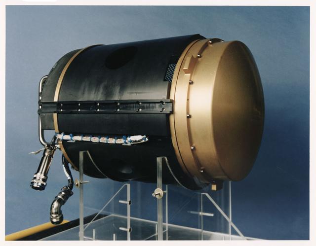 Structure Of Flame Balls At Low Lewis-numbers (SOFBALL) Experiment Mounting Structure (EMS) was used to conduct the SOFBALL experiment on Combustion Module-1. The EMS was inserted into the CM-1 combustion chamber. The chamber was filled with a lean fuel/oxidizer mixture and a spark igniter on the EMS ignited the gas. Very small, weak flames, in the shape of spheres, were formed and studied.