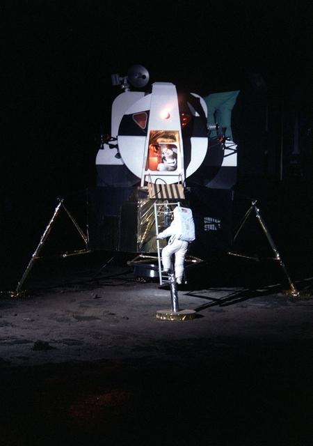 The re-enactment of astronaut Neil Armstrong's first steps off the lunar lander provided quite the occasion for many of the on-lookers at the U. S. Space and Rocket Center in Huntsville, AL, during the celebration of the 30th arniversary of the Apollo 11 lunar landing. The celebration in Huntsville lasted over the weekend with visitors including Buzz Aldrin and other Apollo astronauts.