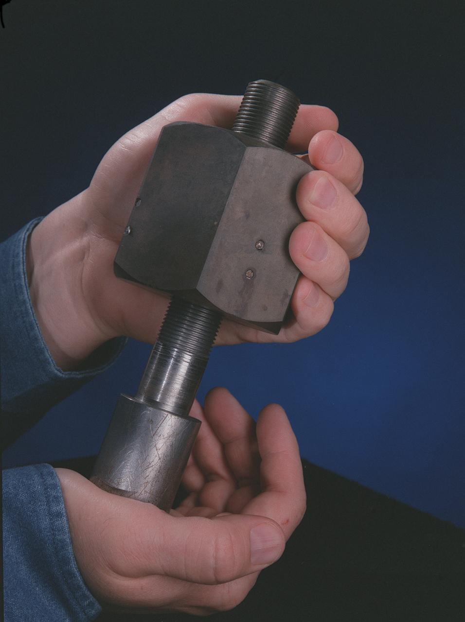 Marshall Space Flight Center (MSFC) has developed a specially-designed nut, called the Quick-Connect Nut, for quick and easy assembly of components in the harsh environment of space, as in assembly of International Space Station. The design permits nuts to be installed simply by pushing them onto standard bolts, then giving a quick twist. To remove, they are unscrewed like conventional nuts. Possible applications include the mining industry for erecting support barriers, assembling underwater oil drilling platforms, fire-fighting equipment, scaffolding, assembly-line machinery, industrial cranes, and even changing lug nuts on race cars. The speed of assembly can make the difference between life and death in different aspects of life on Earth. 