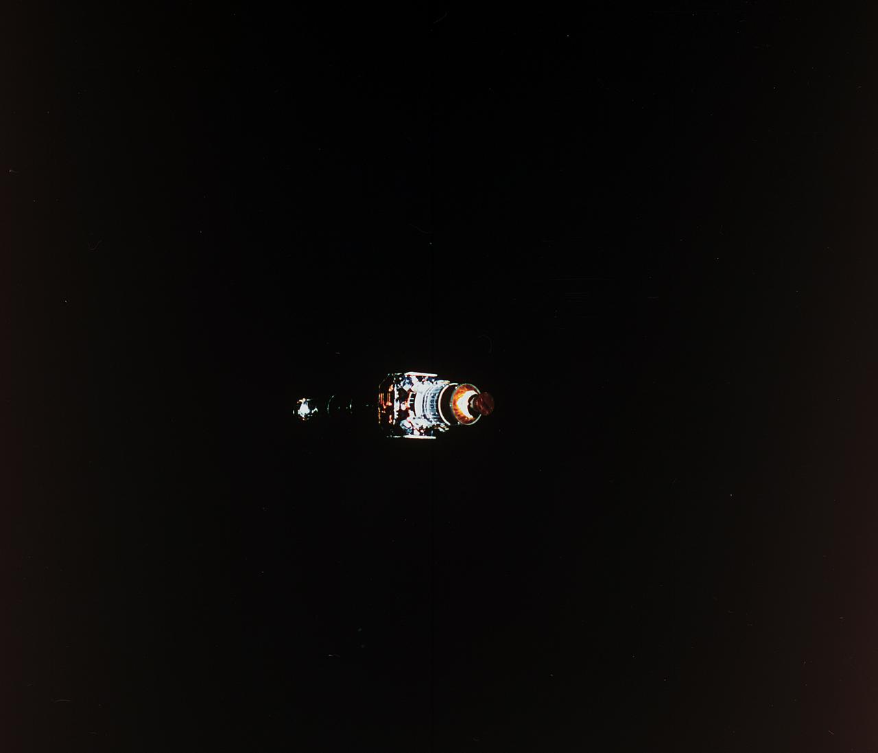 A crew member of the STS-93 mission took this photograph of the Chandra X-Ray Observatory, still attached to the Inertial Upper Stage (IUS), backdropped against the darkness of space not long after its release from Orbiter Columbia. Two firings of an attached IUS rocket placed the Observatory into its working orbit. The primary duty of the crew of this mission was to deploy the 50,162-pound Observatory, the world's most powerful x-ray telescope.