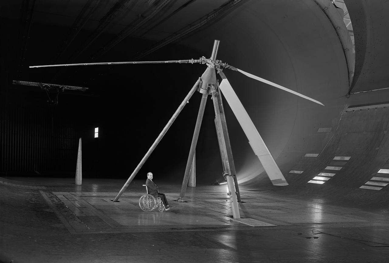 One of the first helicopter tests in the 40 x 80 wind tunnel.  John McCloud, pictured, started helicopter work in the 40 x 80.  Test 150. Testing the effects of camber on rotor blades.