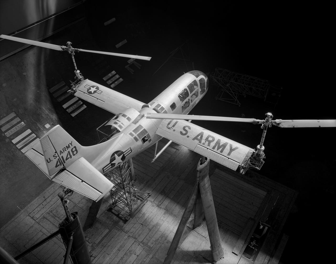 Overhead view of Bell XV-3 Convertiplane. First tilt rotor tested in the 40 x 80 wind tunnel.  Transition aerodynamics studied; shown in hover mode.