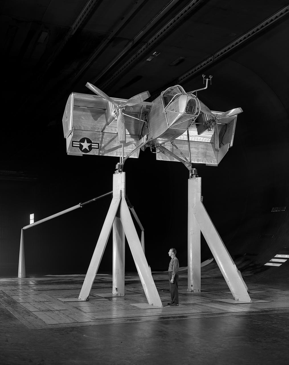 Research engineer, Harry Henninger of the Ryan Aeronautical Company, with the deflected slipstream model VZ-3RY Vertiplane.