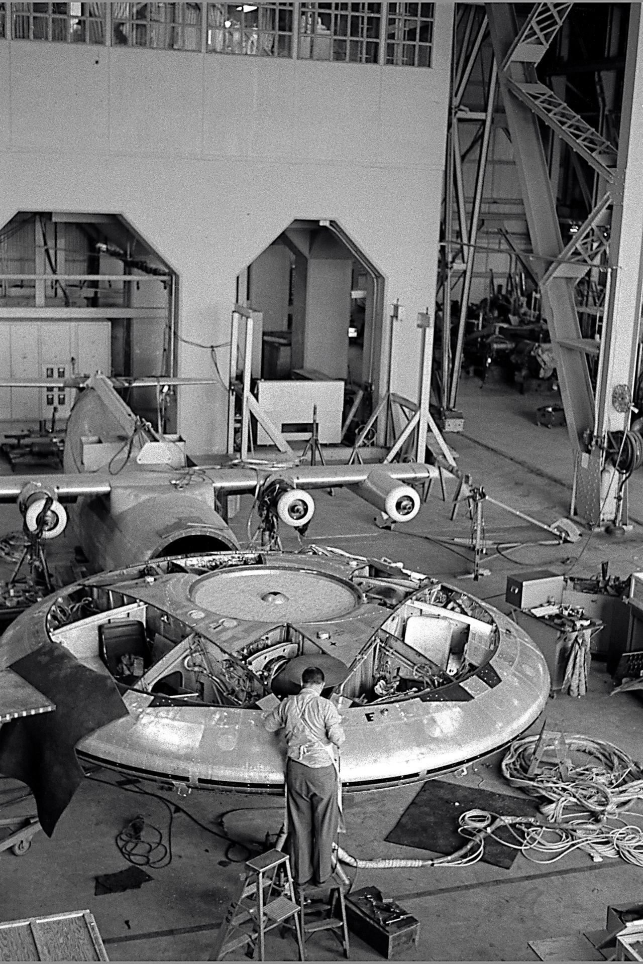A-26418-001. Avrocar in the shop of the 40x80 foot wind tunnel.