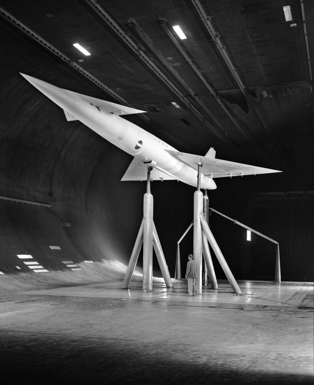 Low Speed investigation of a supersonic transport model in the 40x80 Wind Tunnel.  03/01/1961  R 975 T  Zero angel of attack. Supersonic transport with delta wing and delta conard. 3/4 front view.