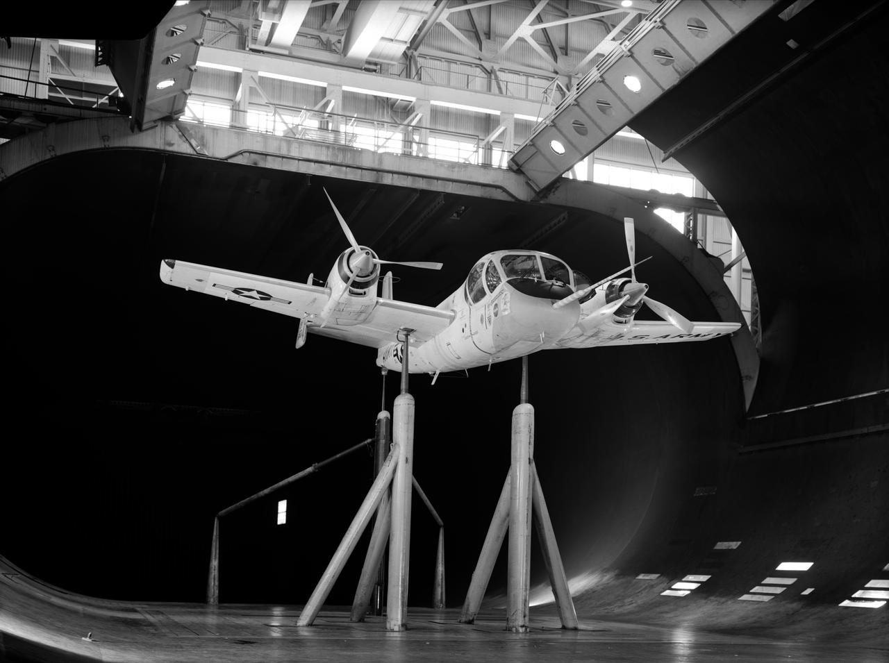 Drag studies for Full Scale wind tunnel test of Grumman YAO-1 airplane, 3/4 front view with propellers on
