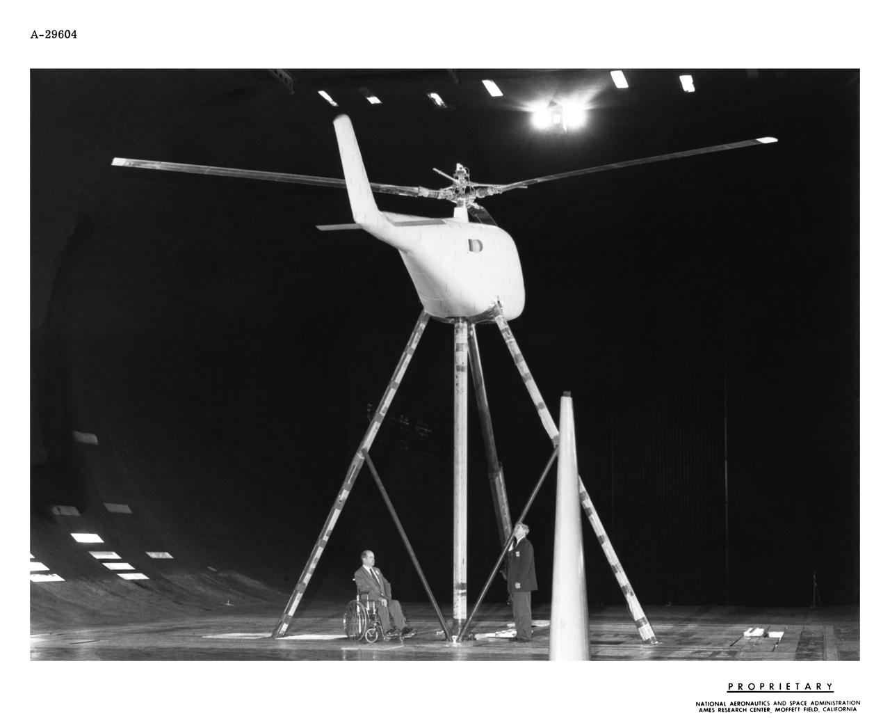 Lockheed XH-51 Experimental Rigid Rotors, no hinges, in Ames 40x80 foot wind tunnel. John McCloud (left sitting) Jack Rabbot (Right).