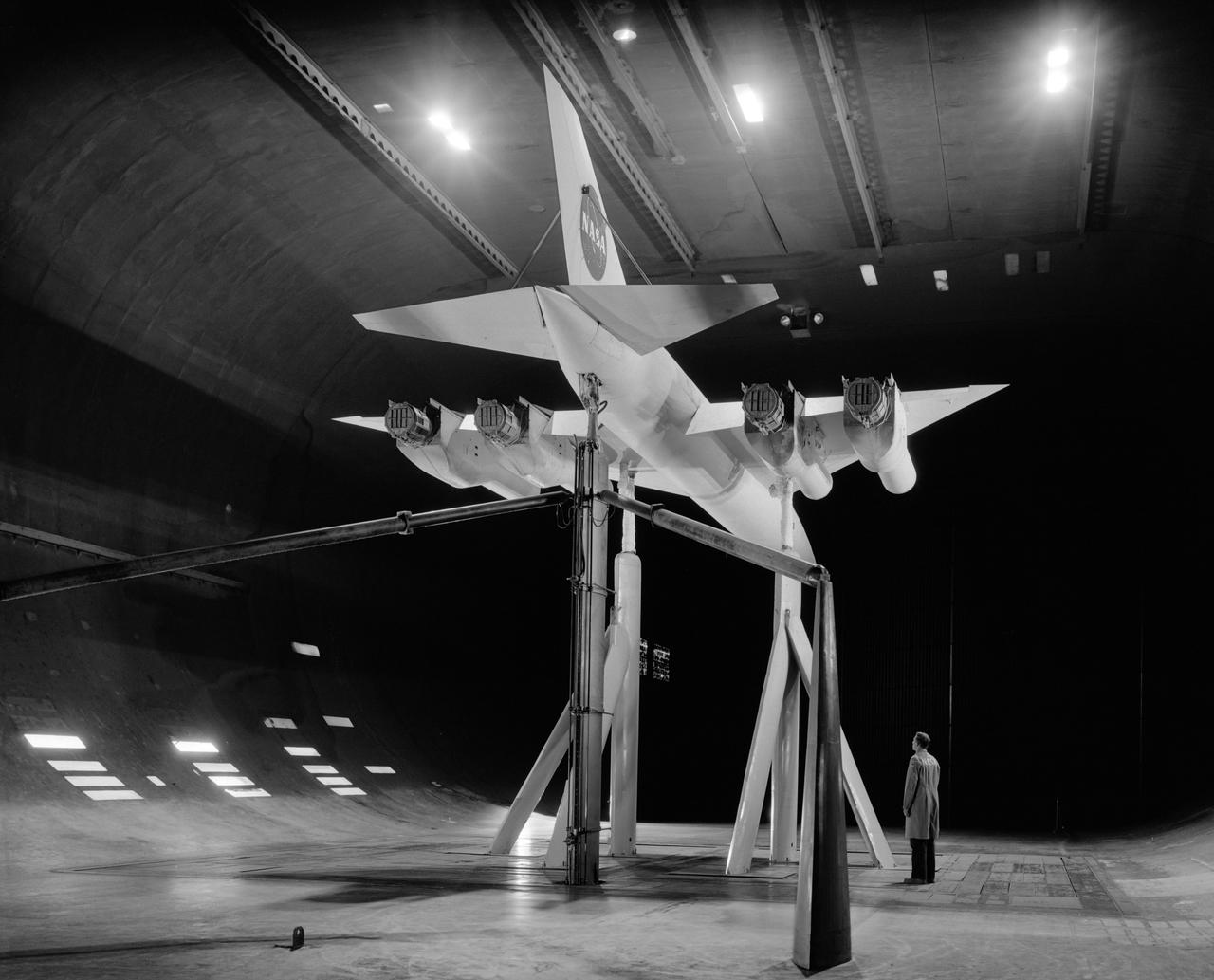 3/4 rear view of SCAT-17 supersonic transport with thrust reverser installed and trailing edge flaps deflected at 30 deg.