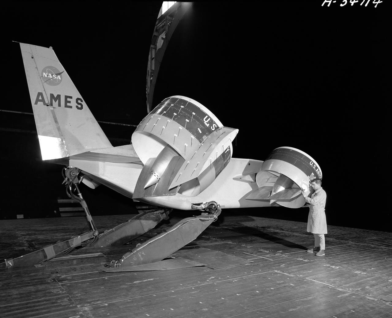 Tandem dual ducted fan mounted on ground plate. 3/4 rear view.  Testing for recirculation decrease in performance of lift fans varies with ground effect.