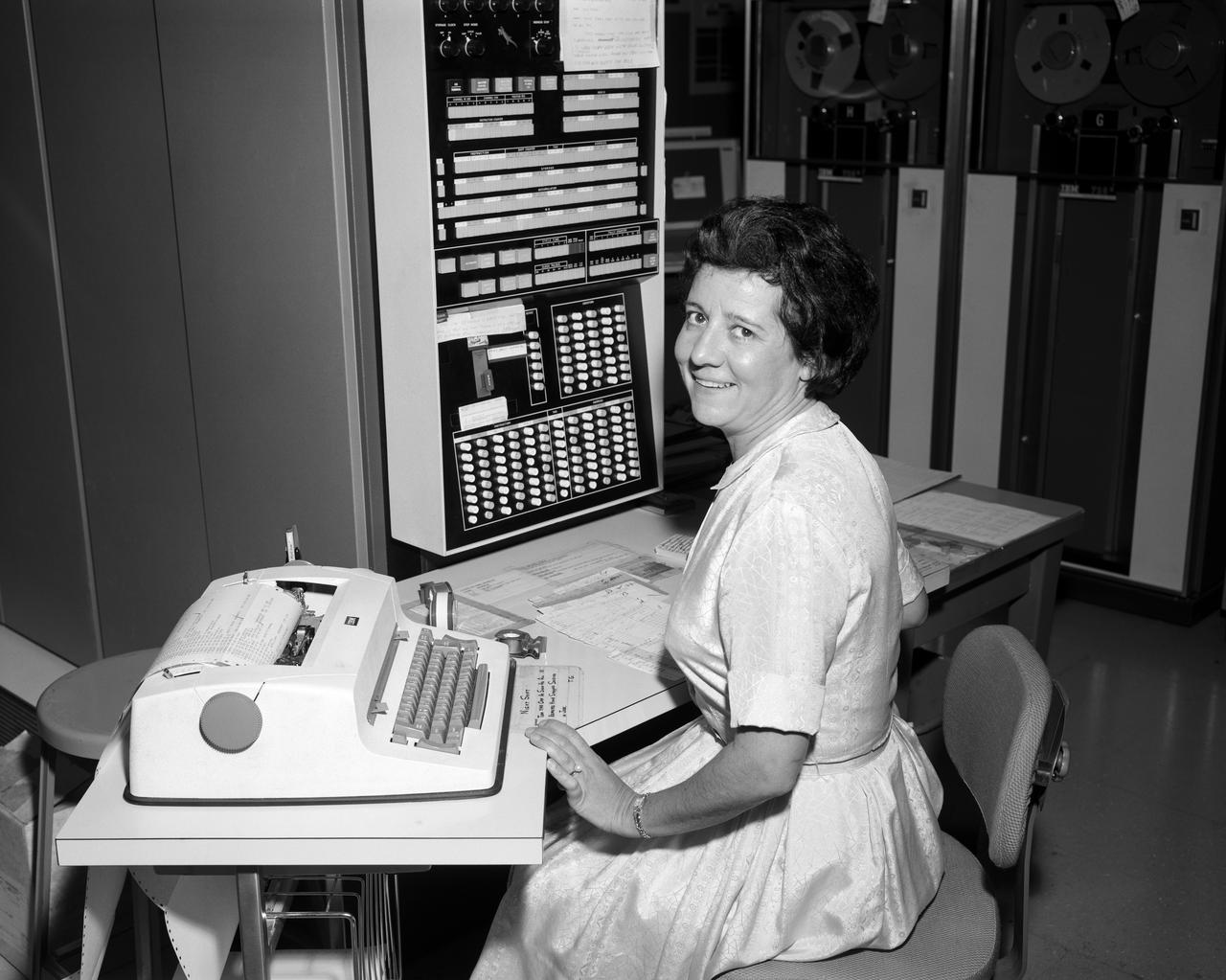 NASA Ames Computer Division, Smith (Weidlich). Candid: Marcia Smith Operating the IBM #740 Computer, Room #119-A, Building N-233.