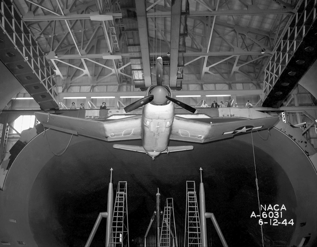 XSB2D-1 First test (no number) Aerodynamic test to forecast the take off distance. George Cooper was the A1:H73 pilot.  Orchard ladders were used to access the ball socket attachments on the struts.