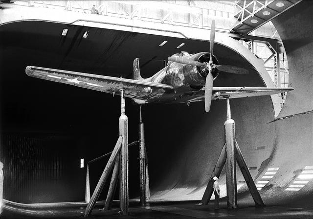 BT2D-1 Airplane lowering into the 40x80 foot Wind Tunnel at Ames.