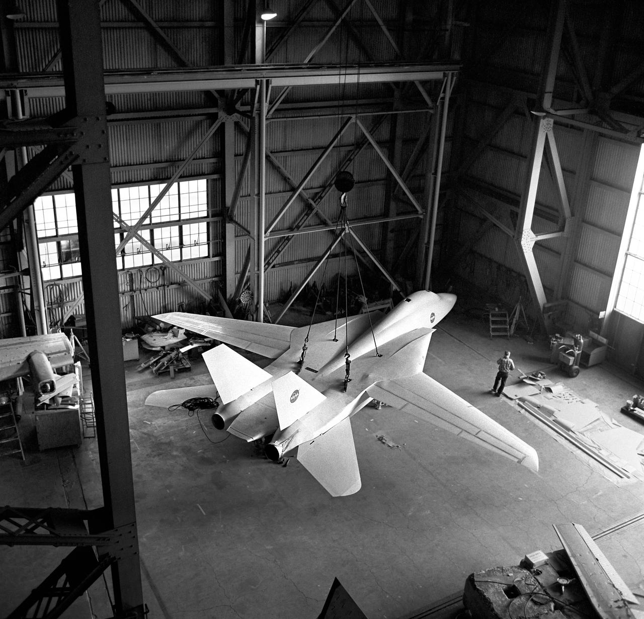F-14A fighter model lifted from the shop floor of the 40 x 80 foot wind tunnel.  3/4 scale