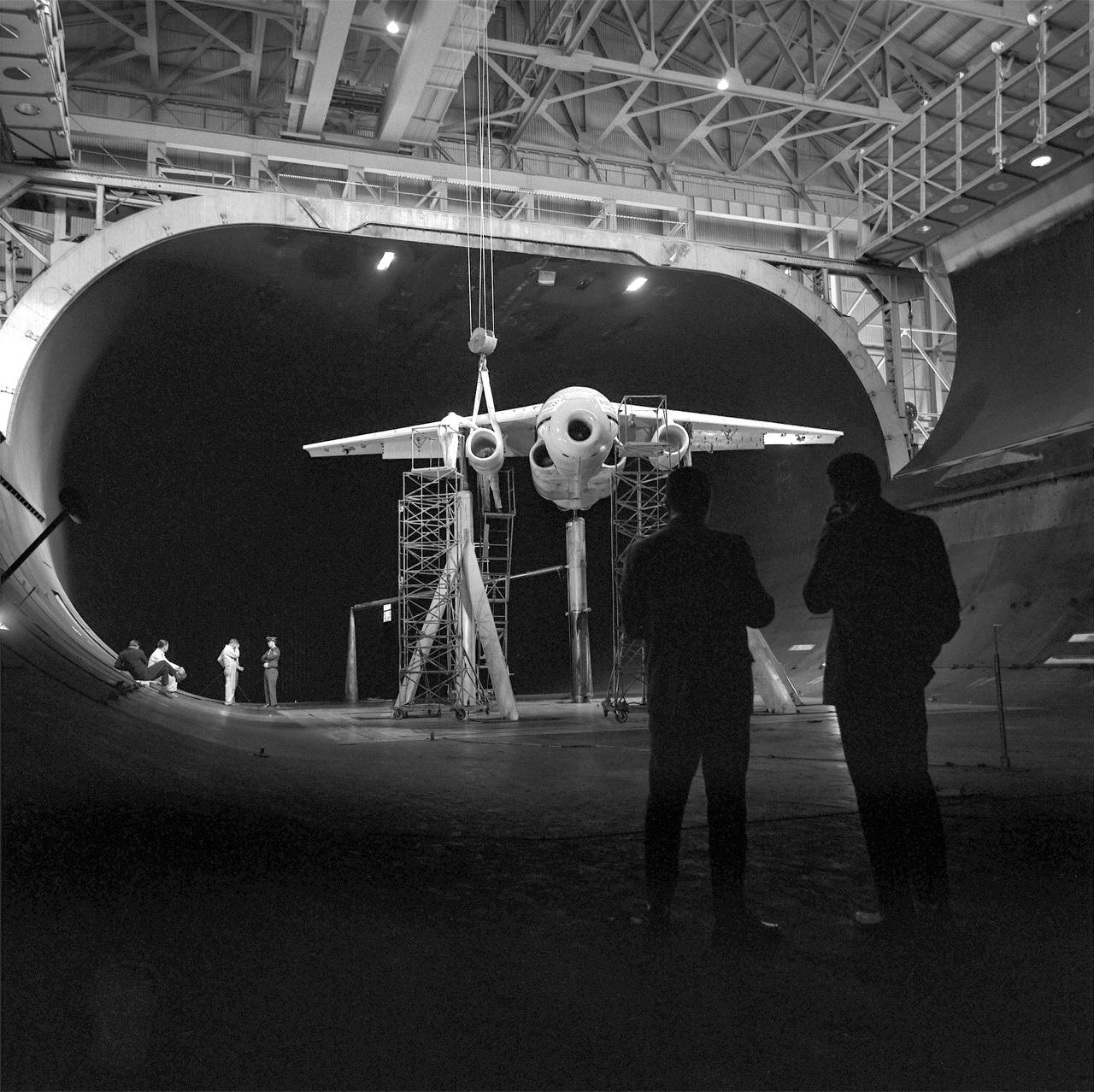 (11/12/1971) 3/4 Scale swept augmentor wing Quest model being installed into the test section of the ames 40 x 80 foot wind tunnel, overhead doors open.