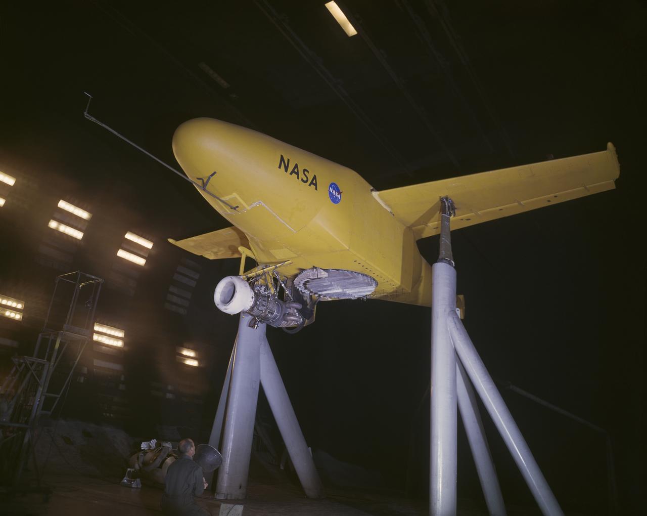 3/4 Low front view of fuselage and fan. Showing jet engine hanging below. Lift fan powered by jet exhaust.