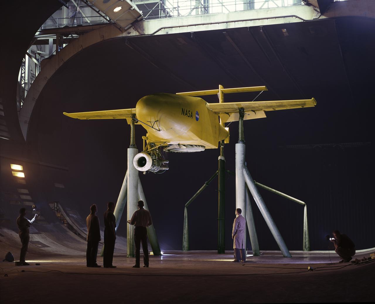 3/4 Low front view of fuselage and fan. Showing jet engine hanging below. Lift fan powered by jet exhaust. General Aerodynamic Characteristics of a Research Model with High Disk Loading Direct Lifting Fan Mounted in Fuselage