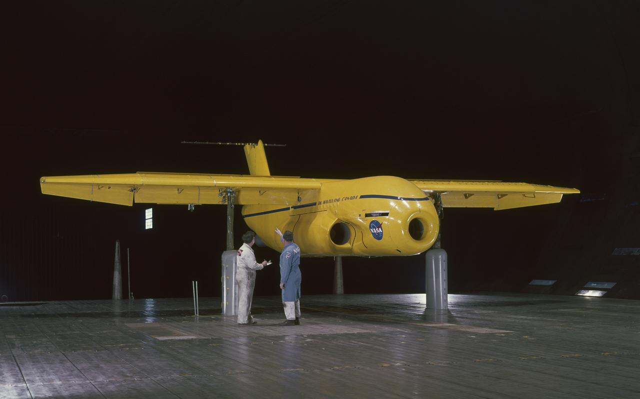 3/4 front view, a=0. de Havilland Augmenter Wing Model, High Lift System in Ames 40x80 Foot Wind Tunnel. Cecil McDonald and Al Wheelband in picture.