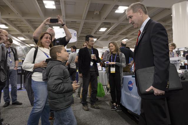 NASA image: ACD15-0224-096. John M. Grunsfeld talks to the attendees of the The AGU meet at the Moscone Center in San Francisco.
