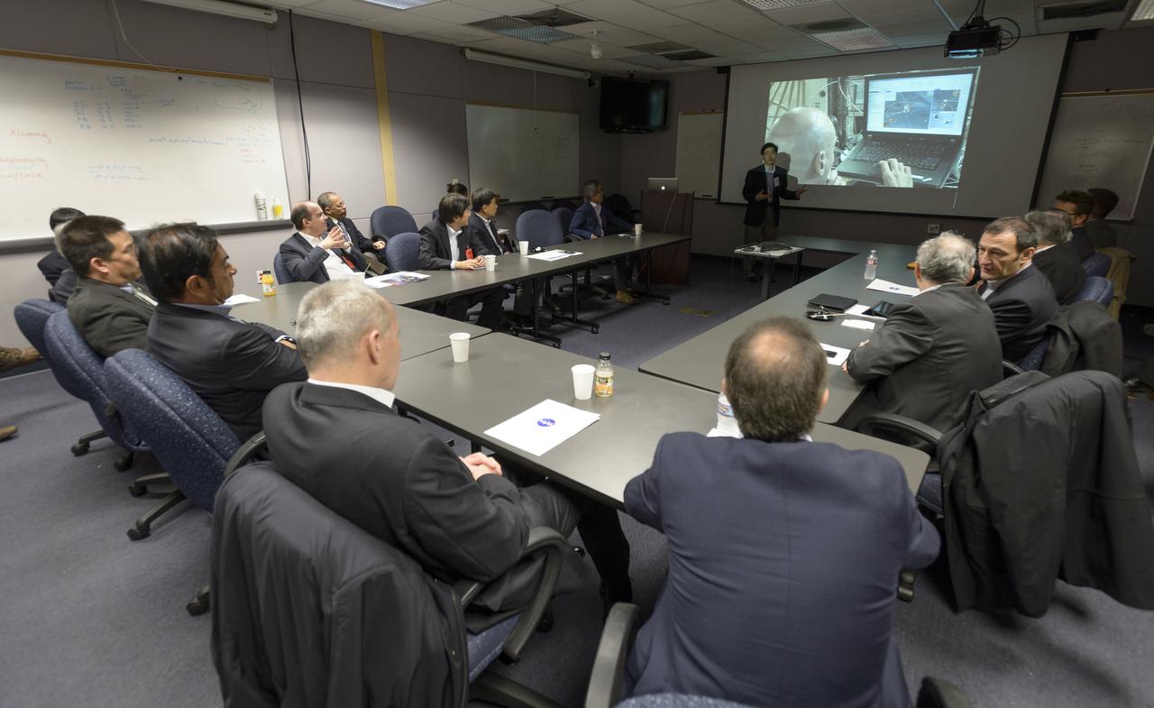 Senior executives from the Renault-Nissan Alliance visited Ames meet with Ames management. Here they are gathered for a Autonomous Drive demo presentation by Terry Fong, Ames Research Center.