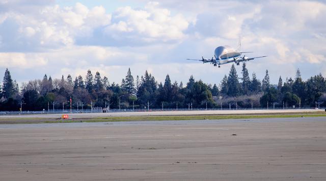 NASA image: NASAs B377SGT Super Guppy Turbine Cargo Airplane lands at Moffett Field at NASA Ames.