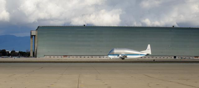 NASA image: NASAs B377SGT Super Guppy Turbine Cargo Airplane lands at Moffett Field at NASA Ames.