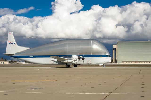 NASA image: NASAs B377SGT Super Guppy Turbine Cargo Airplane lands at Moffett Field at NASA Ames.