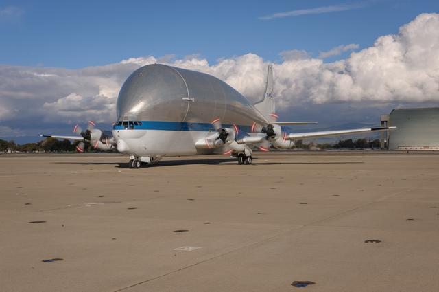 NASA image: NASAs B377SGT Super Guppy Turbine Cargo Airplane lands at Moffett Field at NASA Ames.