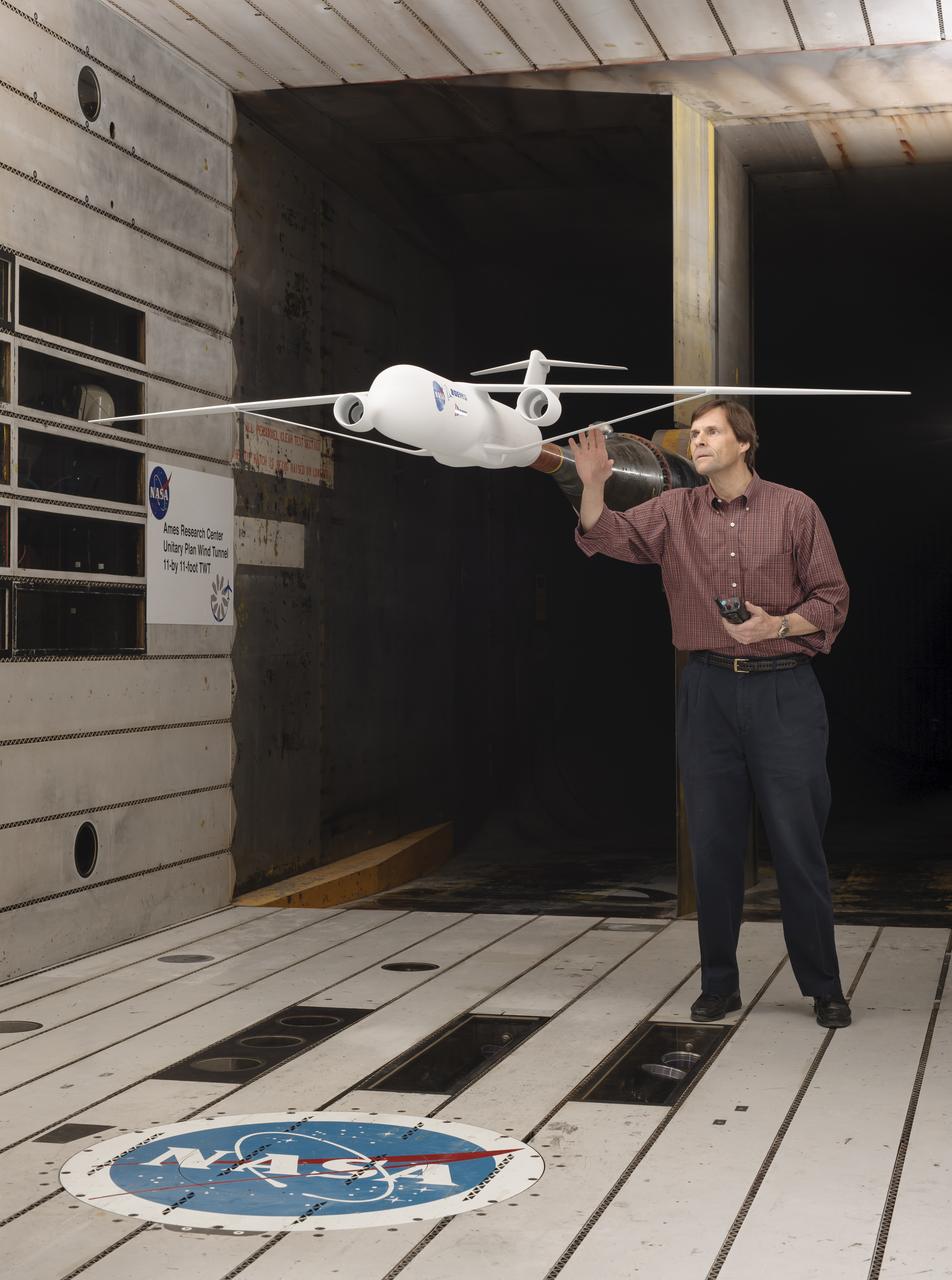 Truss-braced wind model installed in the Ames 11x11 Foot Wind Tunnel for testing as part of the Subsonic Ultra Green Aircraft Research Project (SUGAR) Shown here with test engineer Greg Gatlin, Langley Research Center.