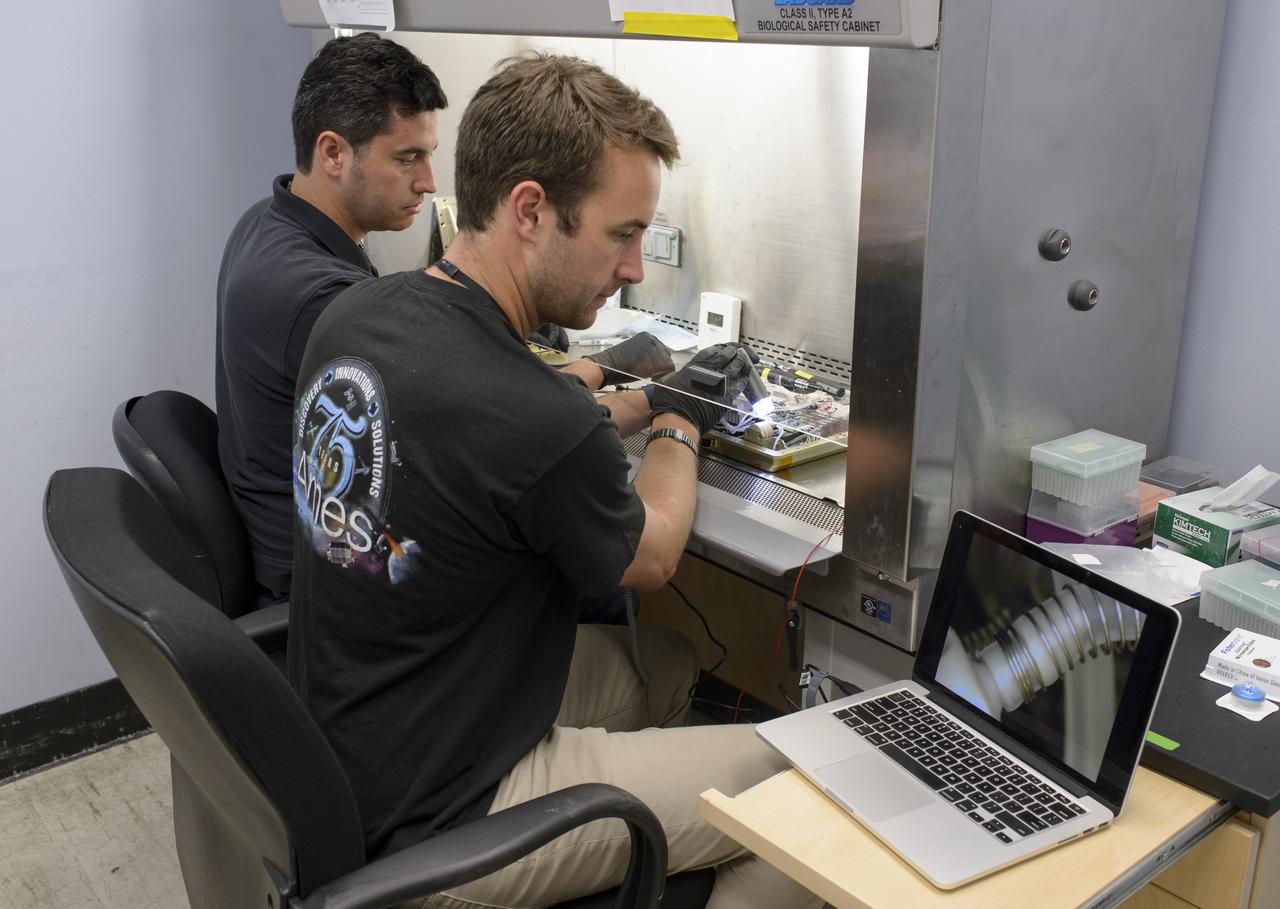 EuCROPIS EVT-2 Power Cell in N-239 Lab Ryan Kent with Flask containing Anabaena Culture