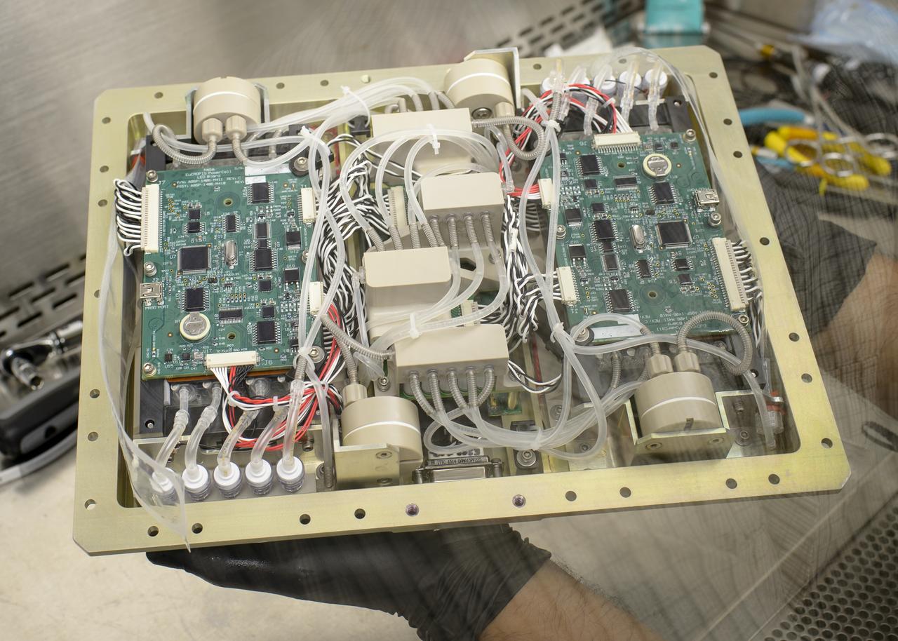 EuCROPIS EVT-2 Power Cell in N-239 Lab Ryan Kent with Flask containing Anabaena Culture