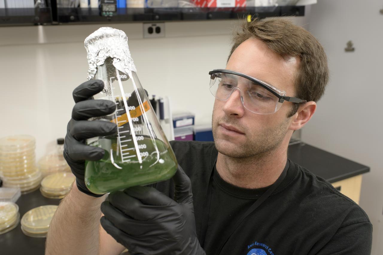 EuCROPIS EVT-2 Power Cell in N-239 Lab Ryan Kent with Flask containing Anabaena Culture