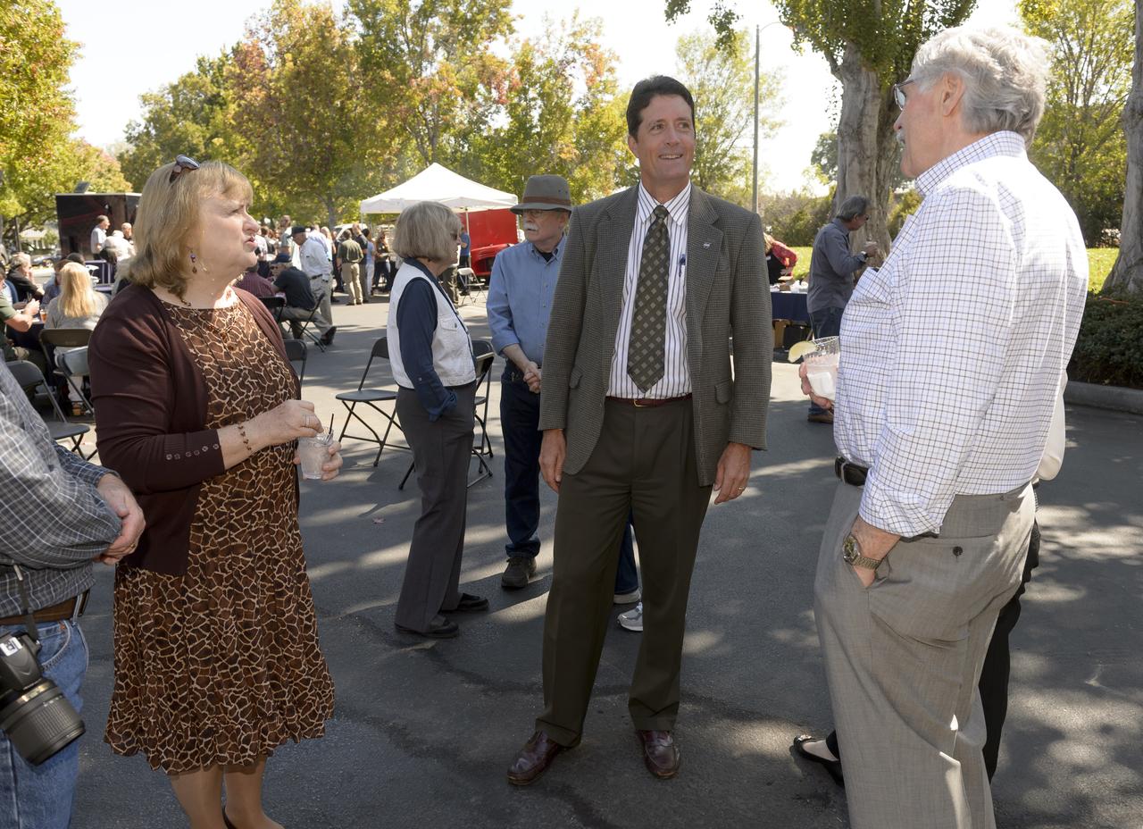 Avation Safety Reporting System (ASRS) 40th Anniversary lunch and open house at the Sunnyvale office.  Linda J. Connell, ASRS Program Director (Left); Thomas A Edwards, Deputy Center Director NASA Ames; Dr. John Lauber, Resident Scientist and pioneer of the ASRS at Ames from 1972-1985 (Right).