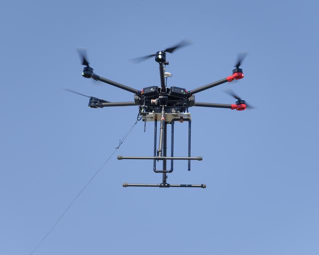 NASA image: The Earth Science Unmanned Aerial System (UAS) Demonstration in the Rover Scape at NASA's Ames Research Center.