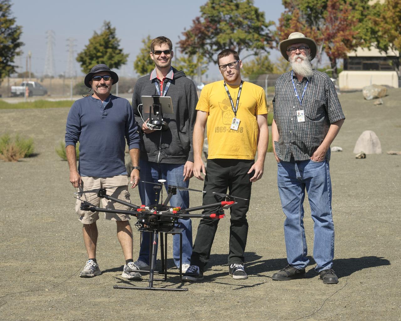 Flight Test in the Roverscape (N-269) at NASA's Ames Research Center, the project team tests the DJI Matrice 600 Unmanned Aerial Vehicle (UAV) equipped with a radio tracking receiver to study the invasive asian carp in the Mississippi River.  Rick, Kolyer, Jonas Jonsson, Ethan, Pinsker, Bob Dahlgren.