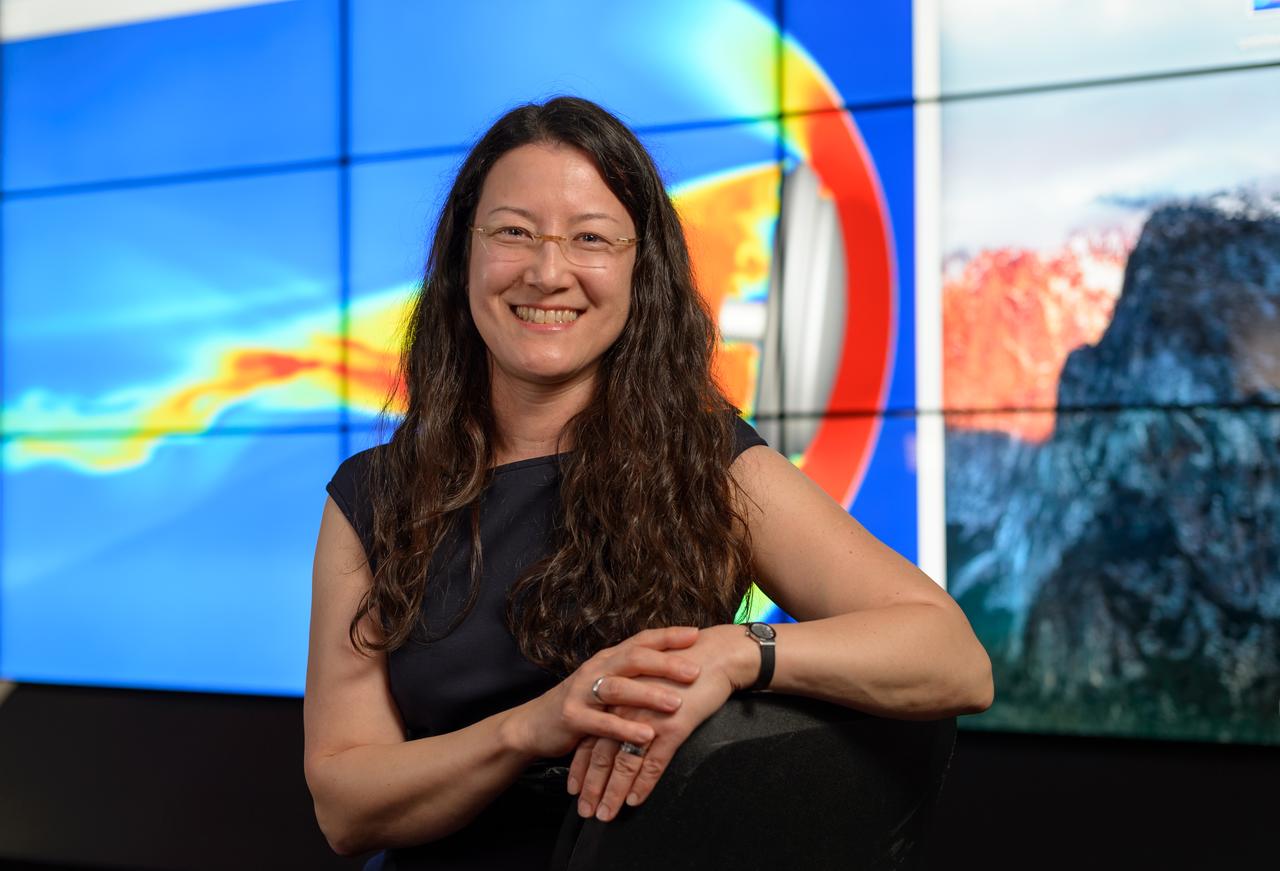 NASA Ames Deputy Director of Exploration Technology Aga M. Goodsell, sat for an on camera interview for the NASA Hidden Figures Project, in front of the Hyperwall (N-252).