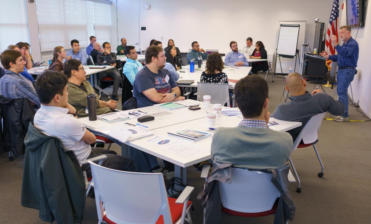 New Employee Orientation swearing-in N-232. Lee Stone, President of the Ames Federal Employees Union addresse the group. 