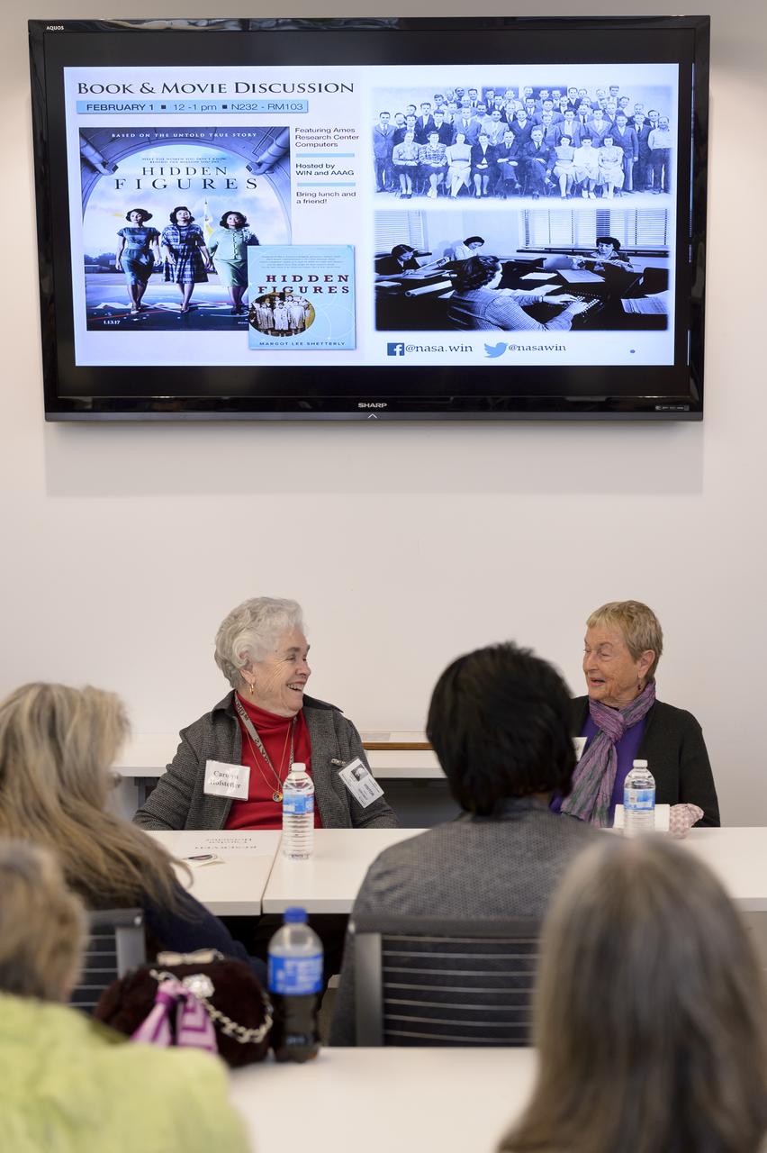 Ames Women's Influence Network (WIN) Hidden Figures talk with "Computers" Carolyn Hofstetter and Carol Mead co-sponsored by the AAAG. At table left to right Carolyn Hofstetter and Carol Mead
