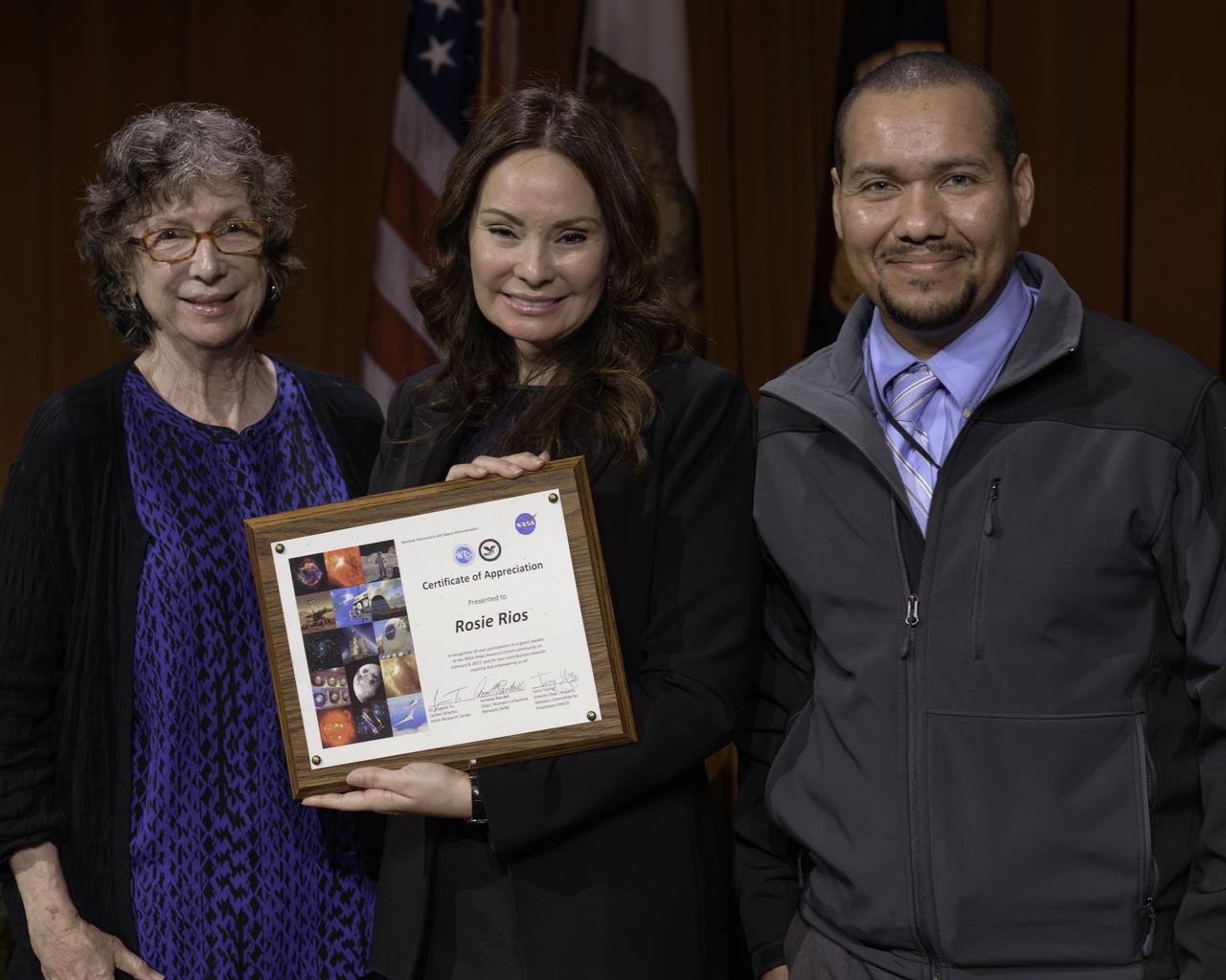 Rosie Rios, the 43rd Treasurer of the United States explores how understanding our history will provide a clearer roadmap for understanding where the country's future is heading.  Presented by the Ames Women's Influence Network (WIN) and the Hispanic Advisory Committee for Employees (HACE) in the Syvertson Auditorium (N-201) at Ames Research Center. Annette Randall, Chair, WIN, Rosie Rios, Ivory Young, HACE Rep.