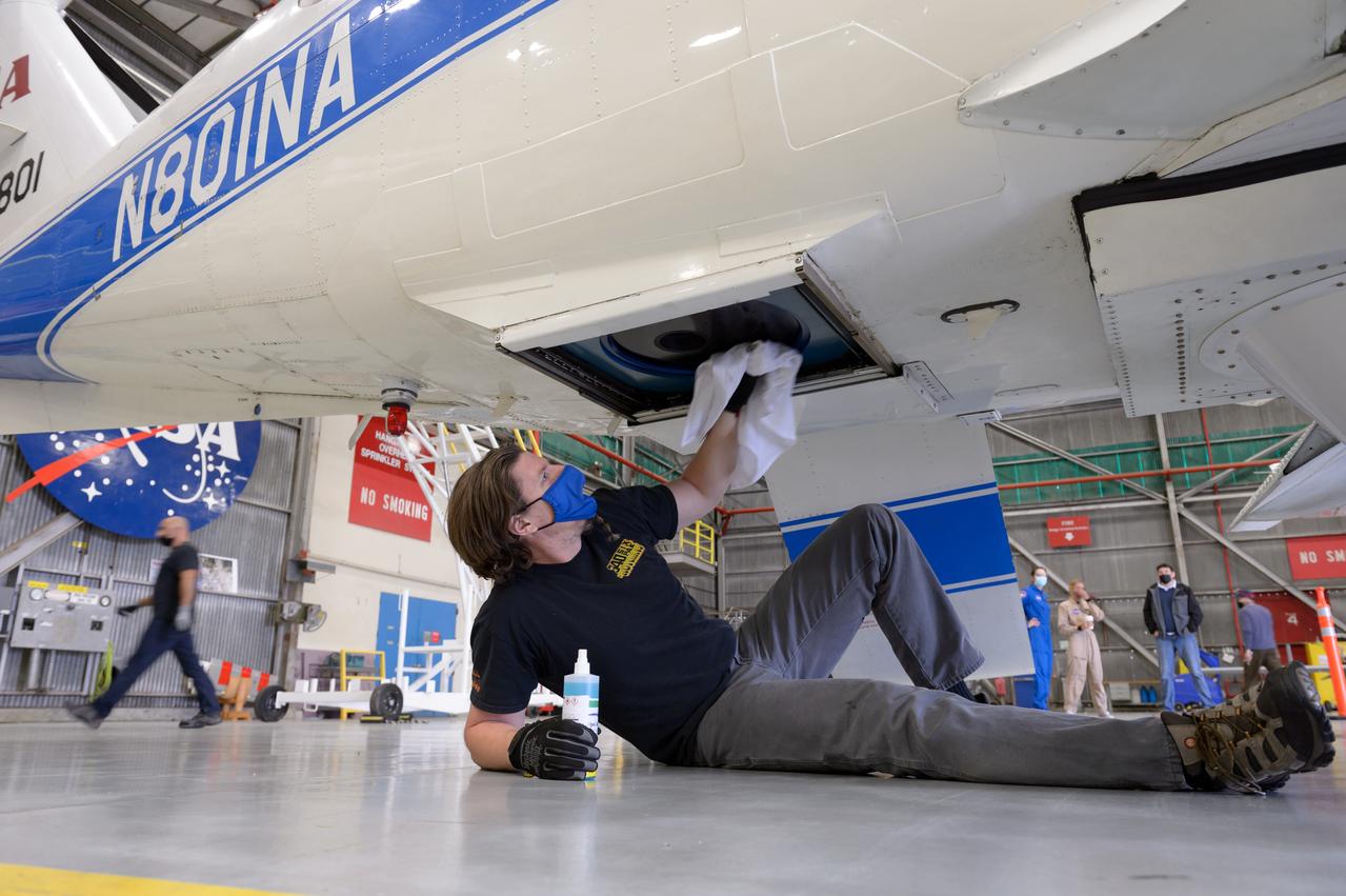 Dan Weishaar, crew chief for the Ames Aircraft Management Office, prepares to deploy NASA's Beechcraft B-200 Super King Air, N801NA, from N248 in support of NASA’s Sub-Mesoscale Ocean Dynamics Experiment, or S-MODE, mission.