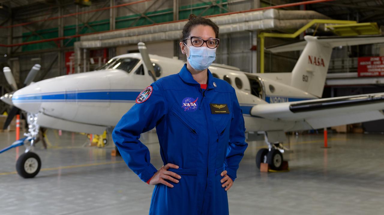 Federica Polverari, post doctorate researcher at the Jet Propulsion Laboratory, in front of NASA's Beechcraft B-200 Super King Air, N801NA, in N248 in support of NASA’s Sub-Mesoscale Ocean Dynamics Experiment, or S-MODE, mission.