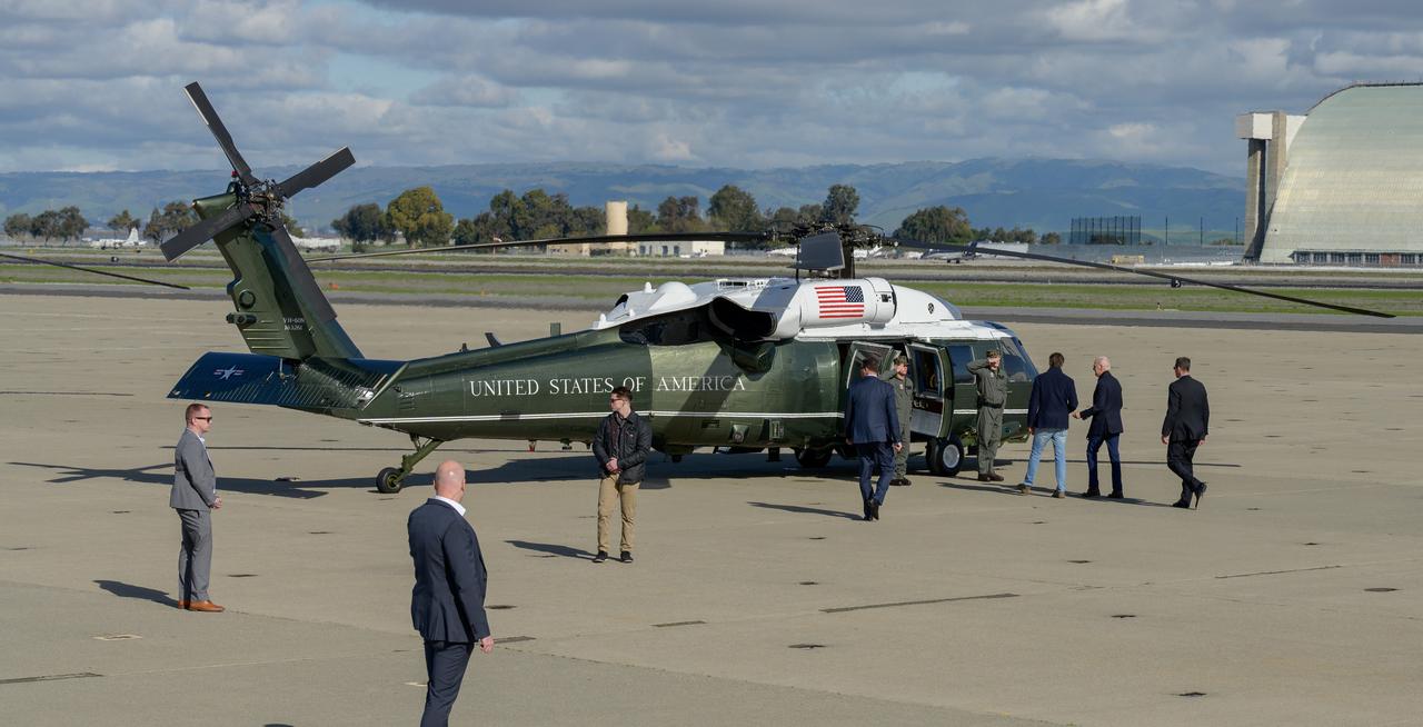 President Joe Biden, accompanied by California Governor Gavin Newsom, boards the Marine One helicopter at Moffett Federal Airfield, near NASA’s Ames Research Center in California’s Silicon Valley, Thursday, Jan. 19, 2023, en route to tour recent storm damage in the state.
