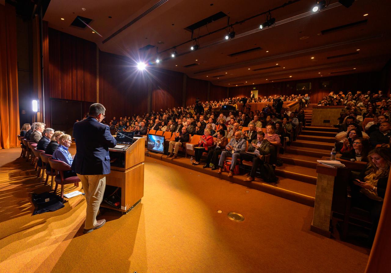 Eugene Tu, center director at NASA’s Ames Research Center in California’s Silicon Valley, offers his opening remarks to the Ames workforce during the “Moon to Mars” town hall in the N201 Syvertson Auditorium. Town hall panel, seated right to left, are NASA Administrator Bill Nelson, Deputy Administrator Pam Melroy, Associate Administrator Bob Cabana, Director of Space Architectures Kurt “Spuds” Vogel, Deputy Associate Administrator for Exploration in the Science Mission Directorate Joel Kearns, Deputy Associate Administrator for Programs in the Space Technology Mission Directorate Walt Engelund, and Deputy Associate Administrator for Exploration Systems Development Cathy Koerner.
