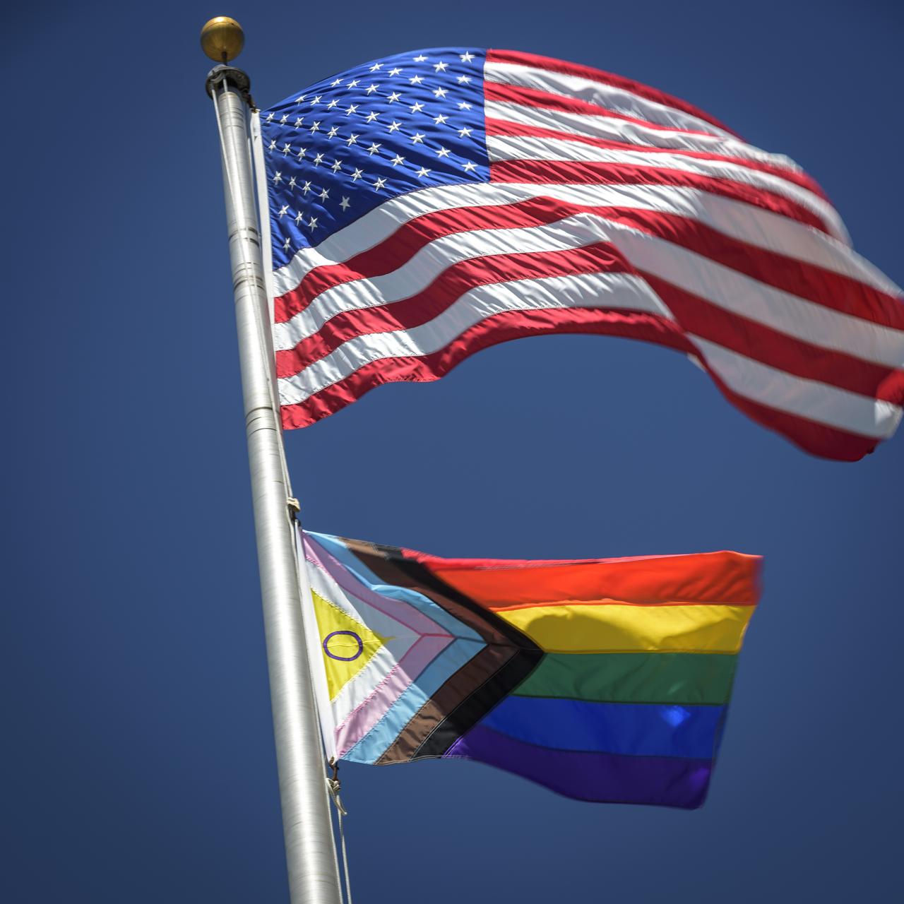 The Intersex Progress Pride flag flies for the first time at any NASA center below the American flag, in front of the Ames Administration Building, N200, to commemorate Pride Month.