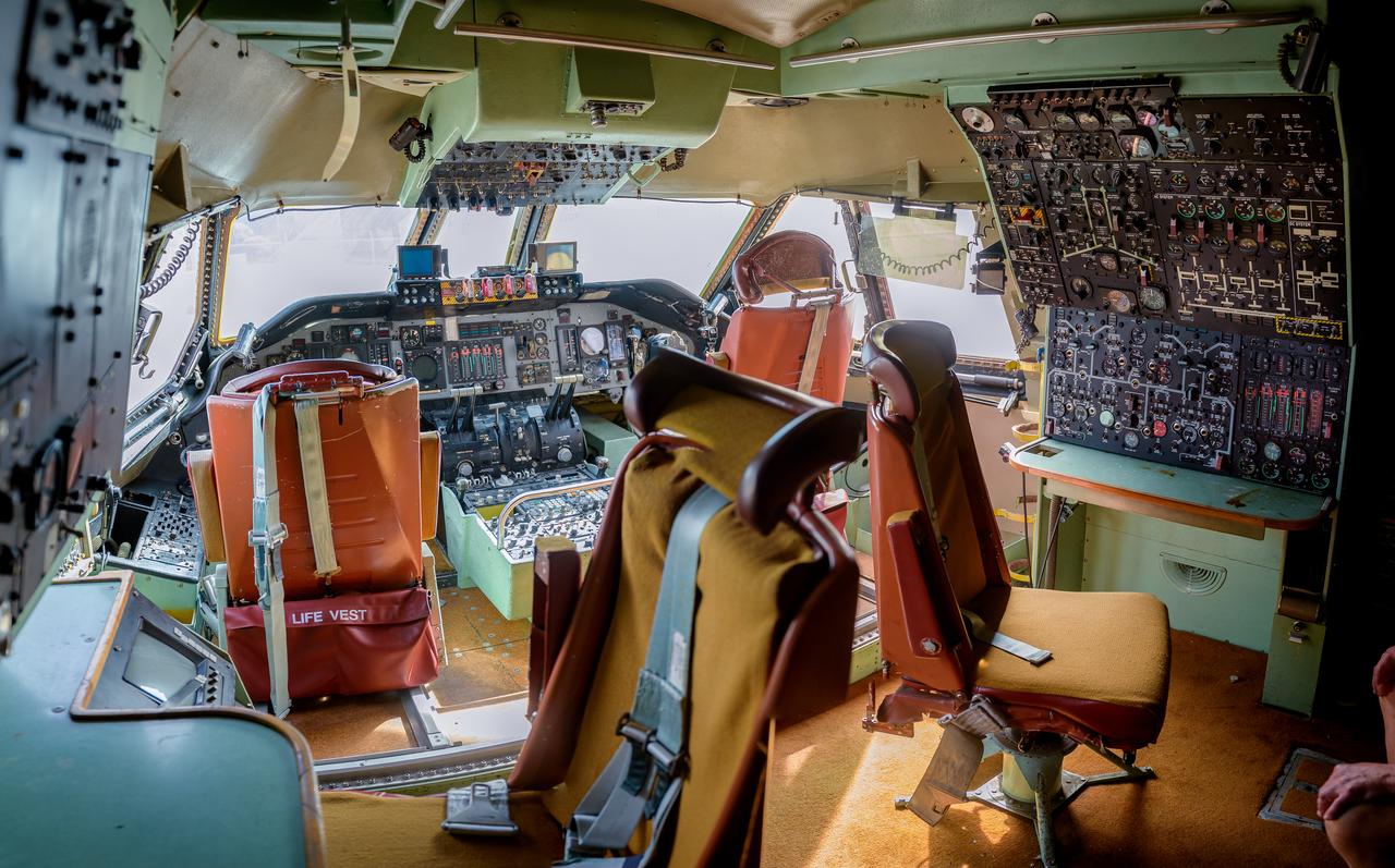 Photo composite (8 frames) of the flight deck of the modified C-141 Kuiper Airborne Observatory, (KAO) (NASA-714), with stations for the flight engineer, co-pilot, pilot, and navigator, who typically only flew on long overseas flights.